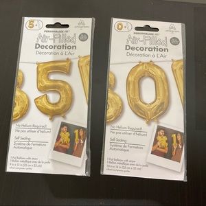 “5” and “0” gold balloons